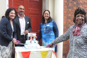 Mrs Usha Khosla, Dr Dinesh Phakkey, Dr Sarbjit Phakkey and Madge Tillsley cut the Dentist @Redhouse 70th anniversary cake