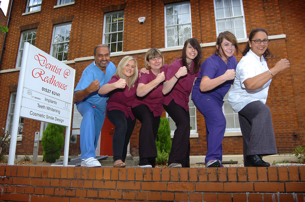 The Redhouse team flex their fundraising muscle. Photo by kind